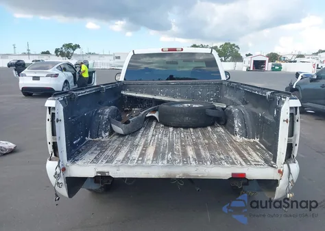 2001 Chevrolet Silverado 1500 из США, поврежденный, VIN 1GCEC14W71Z217897